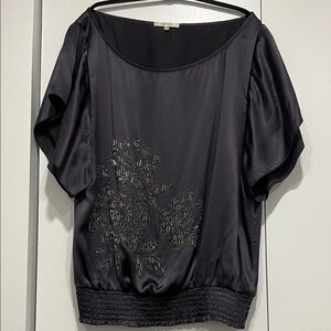 Satin flutter sleeve blouse with elegant beaded flowers